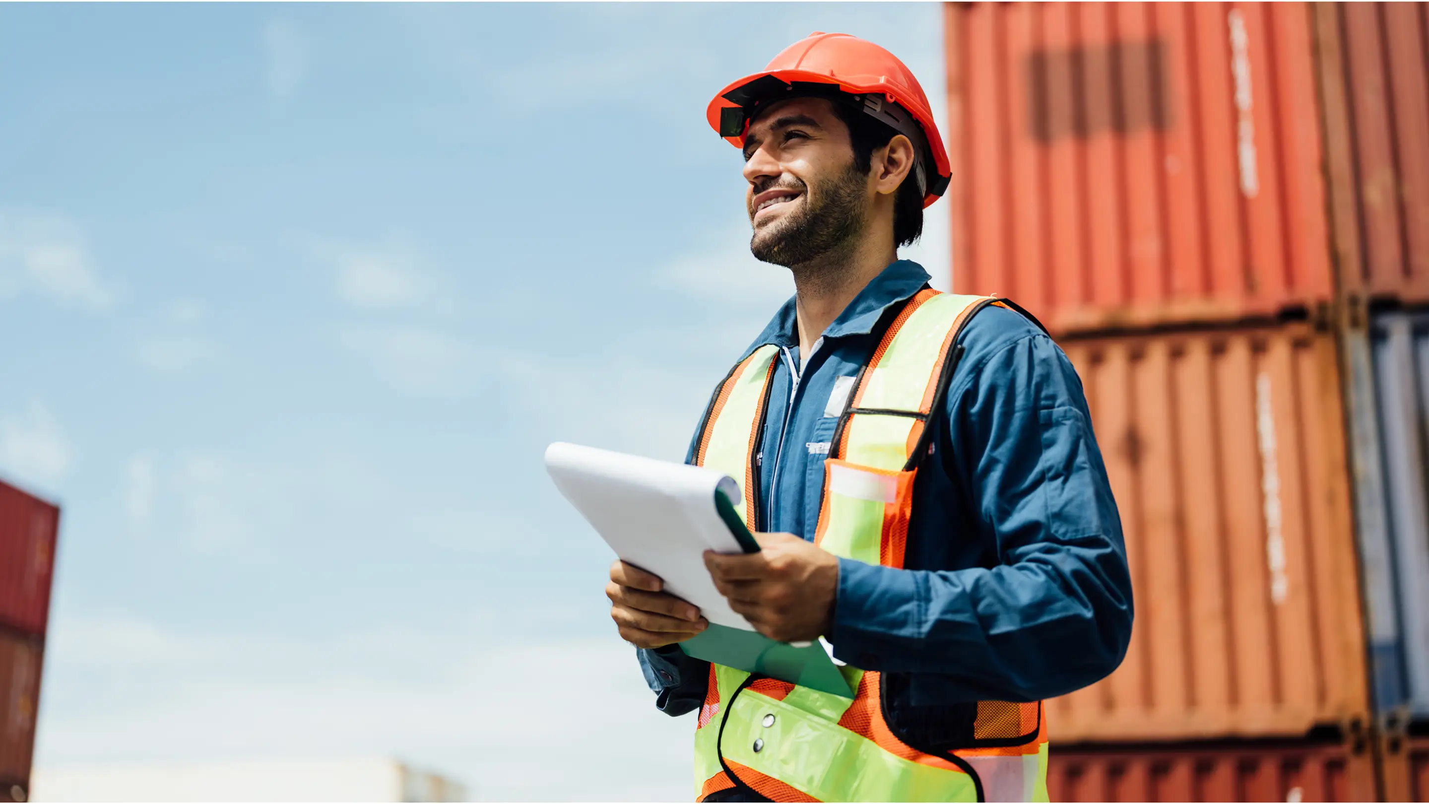 Logistics operator at a Colombian port with import containers from China