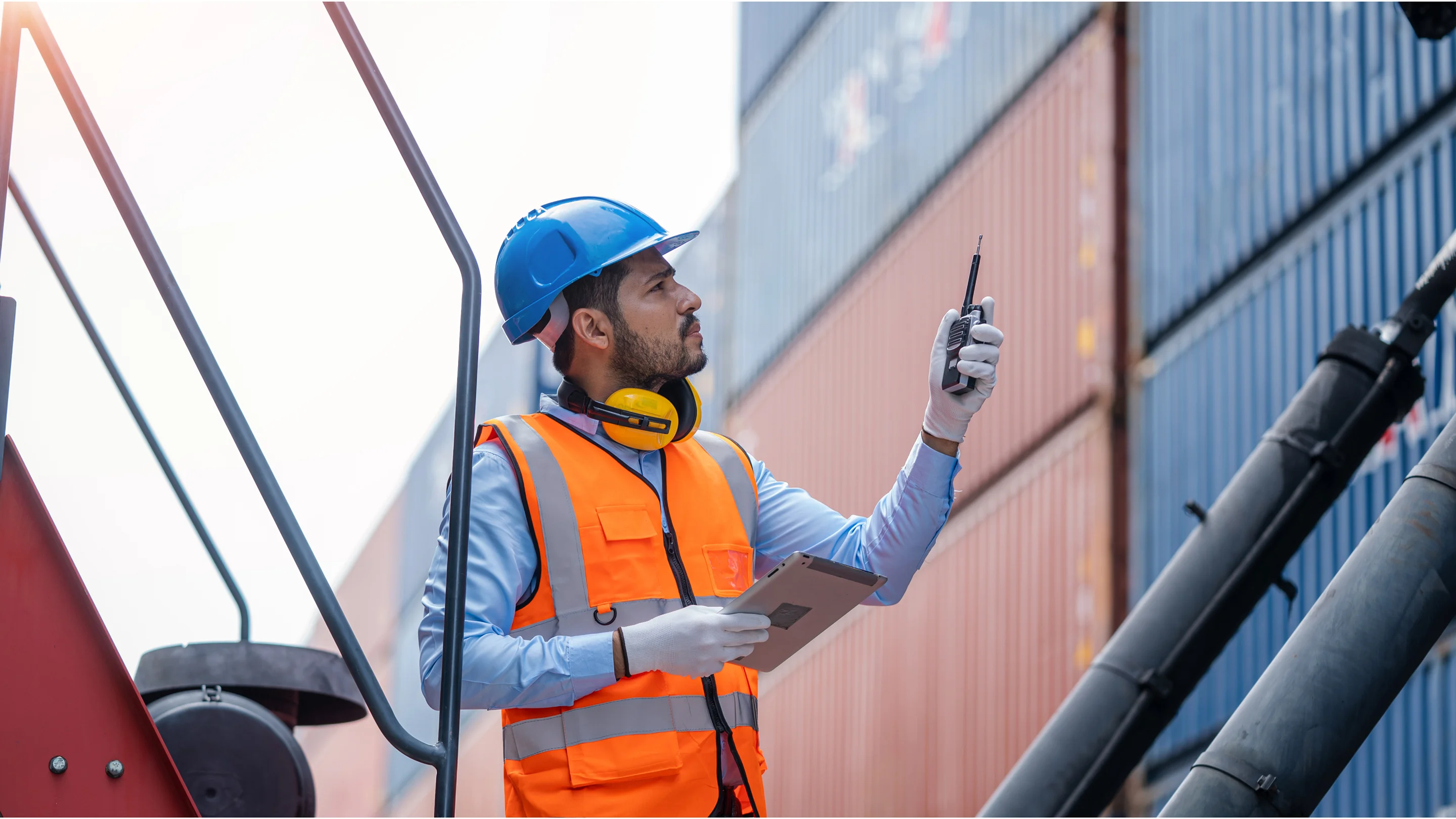 Logistics operator at a Costa Rican port with import containers from China